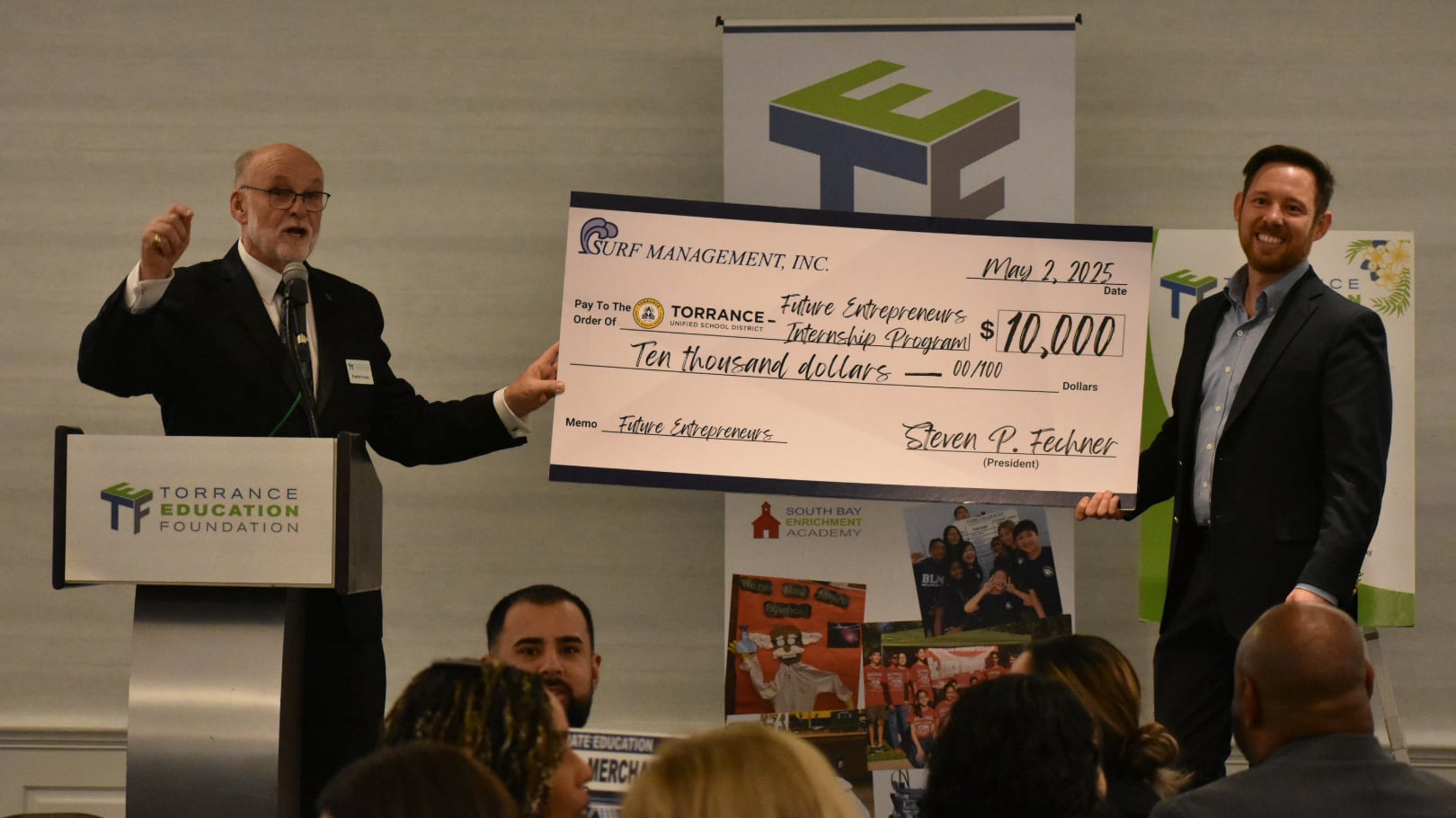 Boy holding TEF sign at the 2017 Skechers Walk.